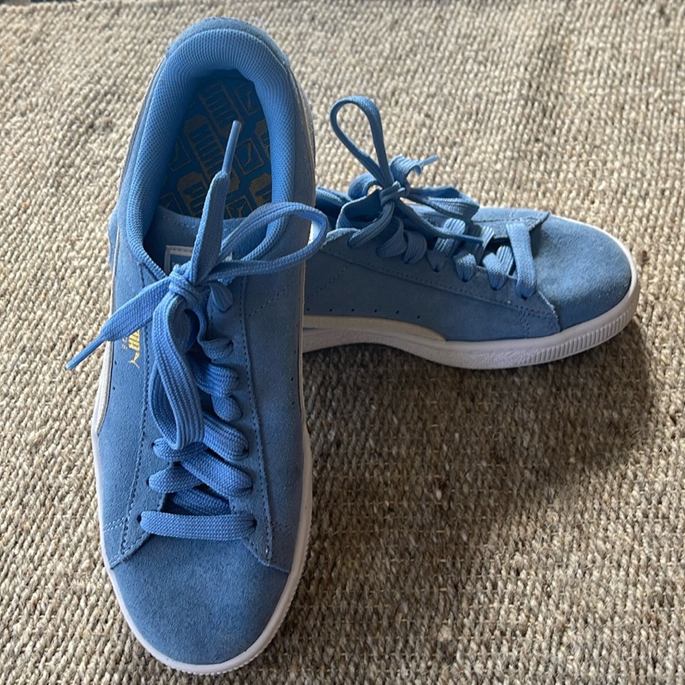 Women’s Puma, light blue, designer sneakers. Suede. Worn once! 8-1/2.